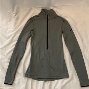 Nike Woman’s Dri-Fit Zip Up Pullover.